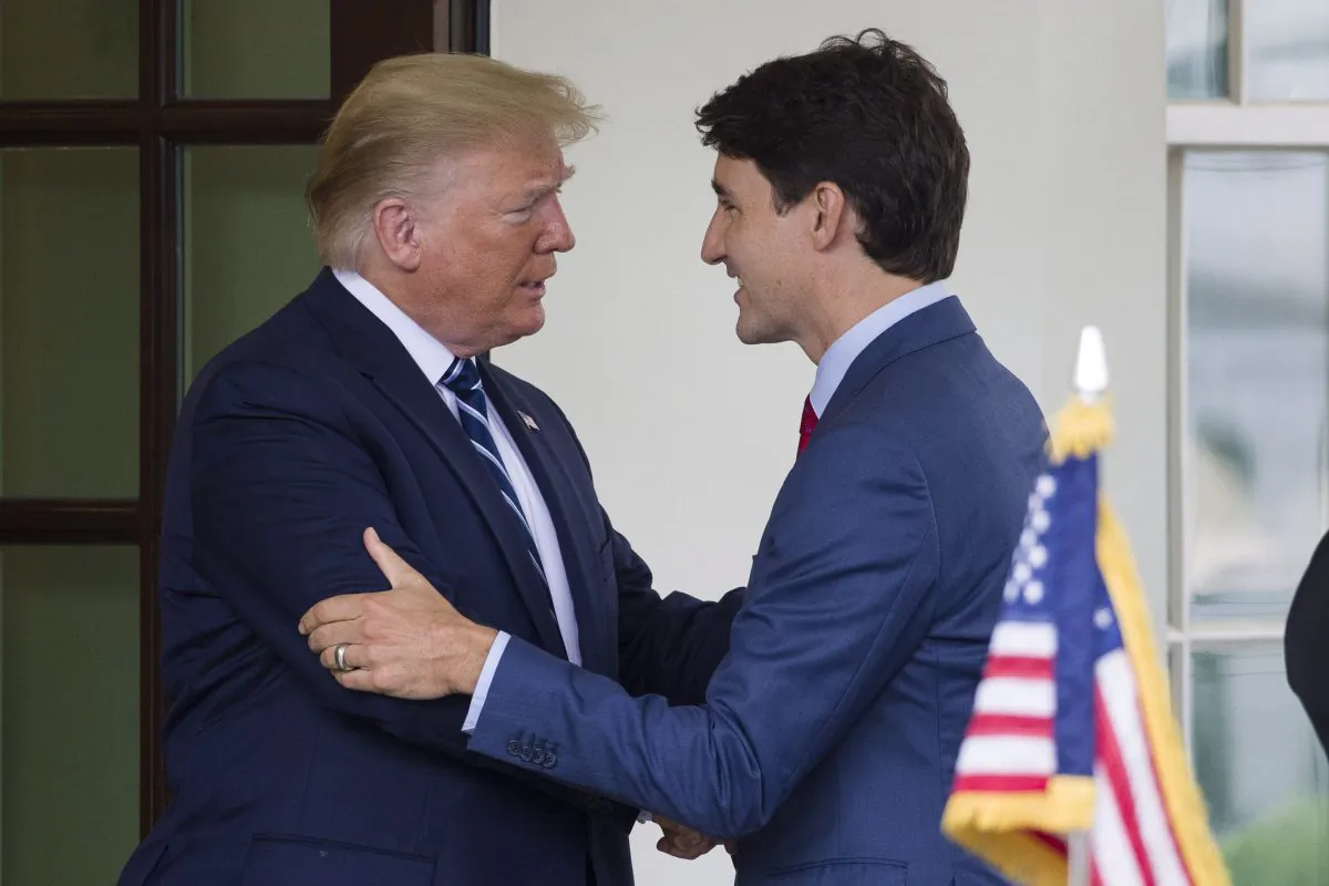 Then-President Donald Trump greets Canadian Prime Minister Justin Trudeau upon his arrival at the White House on June 20, 2019. (AP Photo/Alex Brandon)