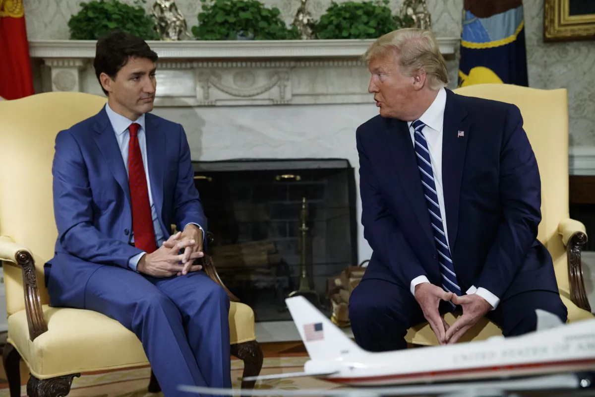 U.S. President Donald Trump meets with Canadian Prime Minister Justin Trudeau in the Oval Office of the White House on June 20, 2019. (AP Photo/Evan Vucci)