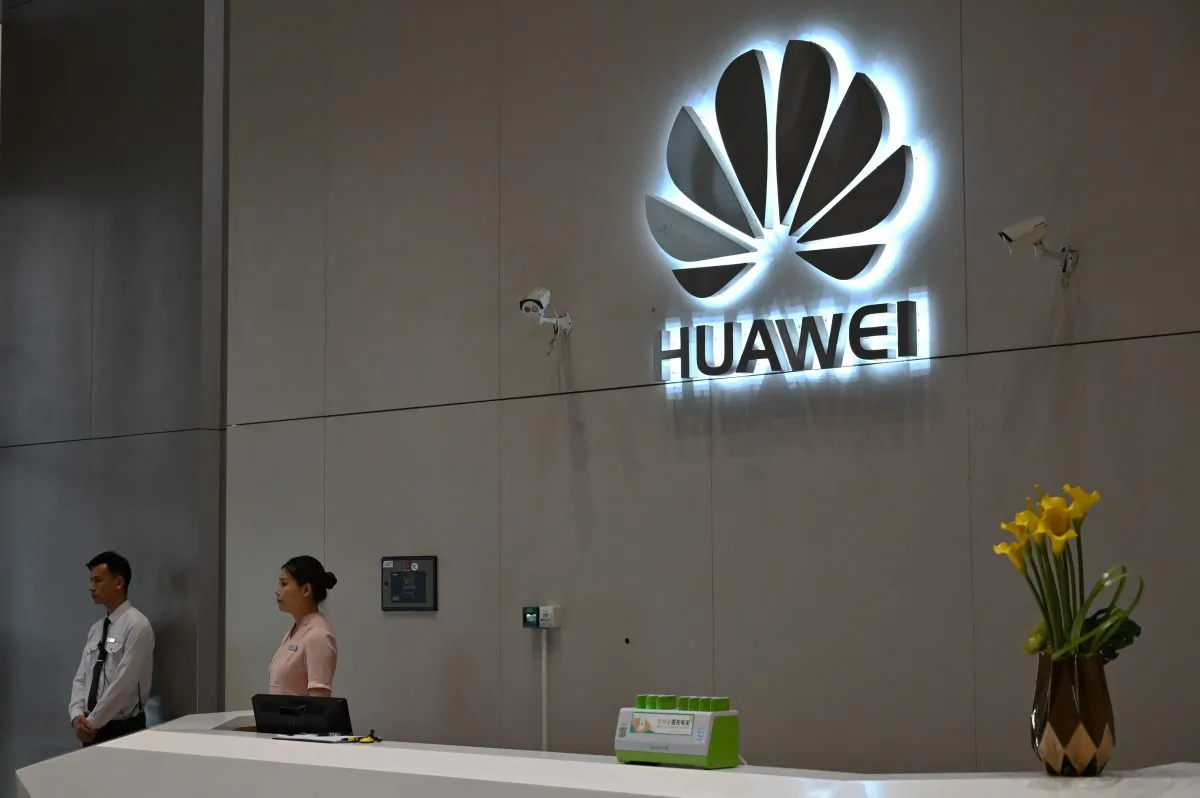 A company logo is displayed at a reception area at the Huawei headquarters in Shenzhen, China's Guangdong province on May 29, 2019. (HECTOR RETAMAL/AFP/Getty Images)
