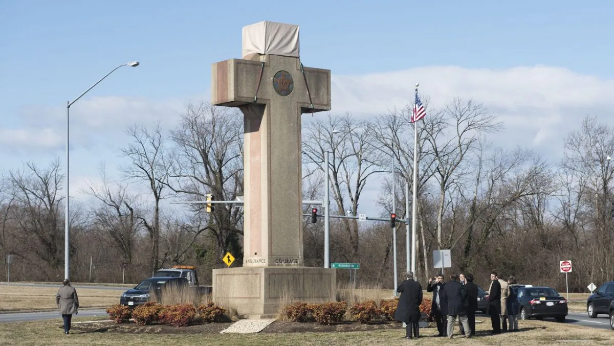 Visitors walk around the 40-foot Maryland Peace Cross dedicated to World War I soldiers in Bladensburg, Md., on Feb.13 ,2019. (Kevin Wolf/AP Photo)