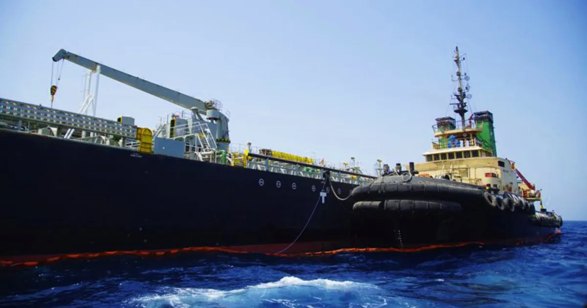 The Panama-flagged, Japanese owned oil tanker Kokuka Courageous, that the U.S. Navy says was damaged by a limpet mine, is anchored off Fujairah, United Arab Emirates on June 19, 2019. (Fay Abuelgasim/AP)