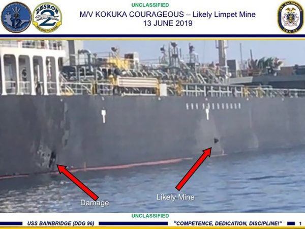 The damage and a suspected mine on the Kokuka Courageous in the Gulf of Oman