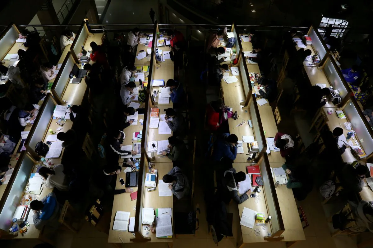 Students study ahead of the entrance exam for postgraduate studies, at a library in Zhengzhou University in Zhengzhou, Henan Province, China on Dec. 13, 2017. (Reuters)