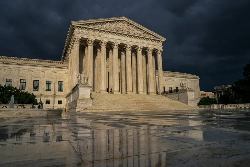 The Supreme Court is seen under stormy skies in Washington on June 20, 2019. (J. Scott Applewhite/AP)
