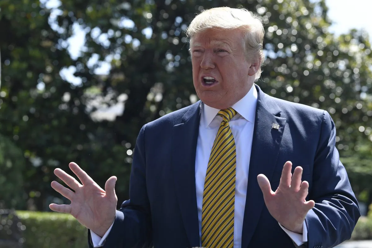 President Donald Trump speaks to reporters on the South Lawn of the White House in Washington on Saturday, June 22, 2019, before boarding Marine One for the trip to Camp David in Maryland. (Susan Walsh/AP)