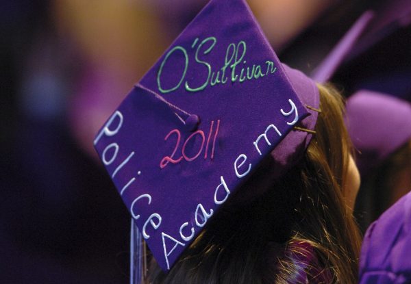Tara O'Sullivan decorated her mortar board with her police academy plans