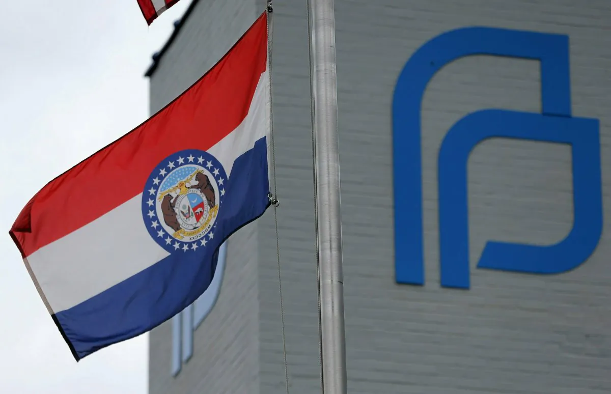 The Missouri state flag flies outside of the Planned Parenthood of the St. Louis Region and Southwest Missouri, the state's last operating abortion clinic, on June 21, 2019. (Christian Gooden/St. Louis Post-Dispatch via AP)