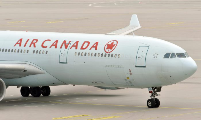 File photo of an Air Canada plane arriving at the international airport in Munich, Germany, on Aug. 3, 2009. (Joerg Koch/AFP/Getty Images)