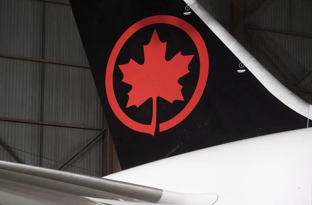 The tail of an Air Canada Boeing 787-8 Dreamliner aircraft is seen at a hangar at the Toronto Pearson International Airport in Mississauga, ON., on February 9, 2017. (Mark Blinch/The Canadian Press)