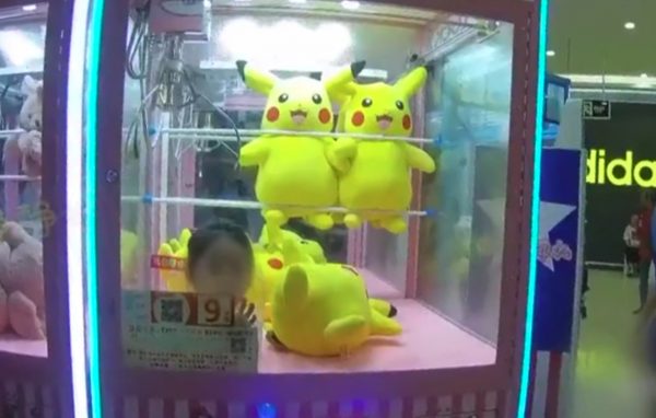 Girl claw machine pikachu