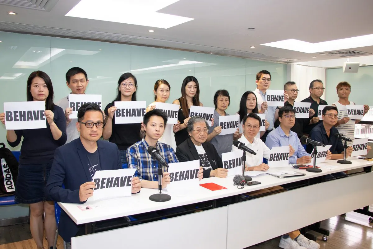 Wong Yam-hong (front row, fourth from L) presents a joint statement about police violation in patient privacy in a press conference in Hong Kong on June 23, 2019. (Cai Wenwen/The Epoch Times)