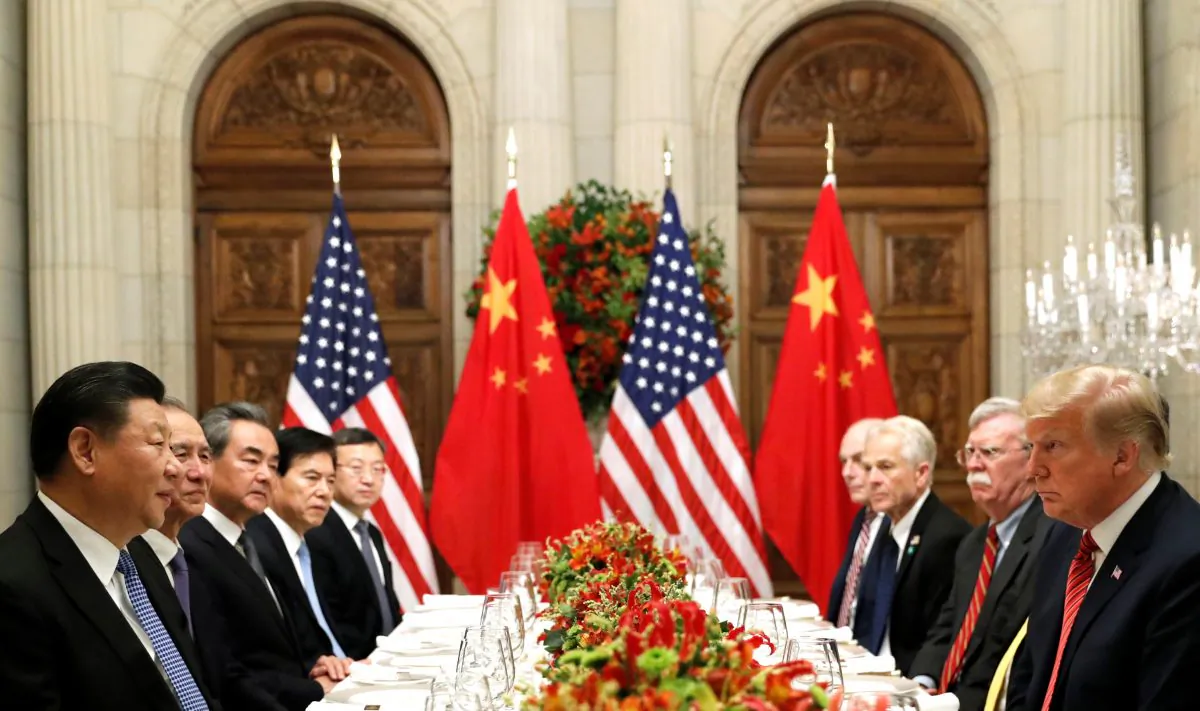 U.S. President Donald Trump, U.S. Secretary of State Mike Pompeo, U.S. President Donald Trump's national security adviser John Bolton and Chinese President Xi Jinping attend a working dinner after the G20 leaders summit in Buenos Aires, Argentina Dec. 1, 2018. (Reuters/Kevin Lamarque)