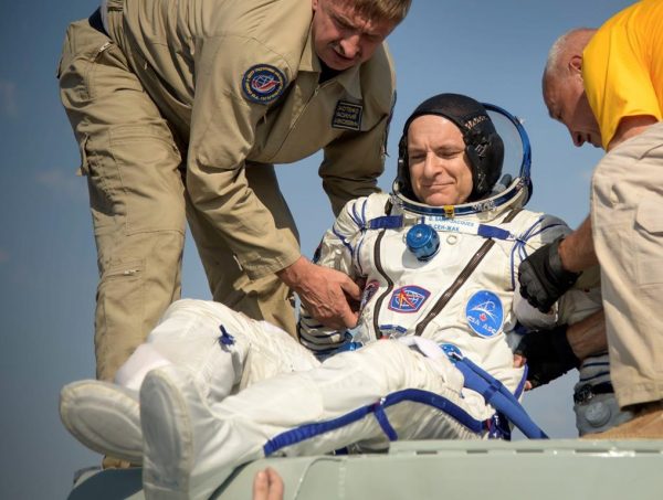 In this photo provided by NASA, Expedition 59 astronaut David Saint-Jacques of the Canadian Space Agency (CSA) is helped out of the Soyuz MS-11 spacecraft just minutes after he, NASA astronaut Anne McClain, and Roscosmos cosmonaut Oleg Kononenko, landed in a remote area near the town of Zhezkazgan, Kazakhstan on June 25, 2019. (Bill Ingalls/NASA via AP/The Canadian Press)
