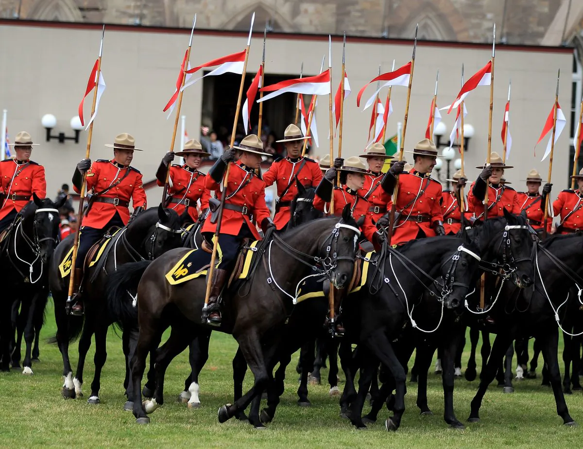 Royal Canadian Mounted Police take part in a display during Canada Day celebrations on Parliament Hill in Ottawa, Canada, on July 1, 2010.  (Chris Jackson/Getty Images)