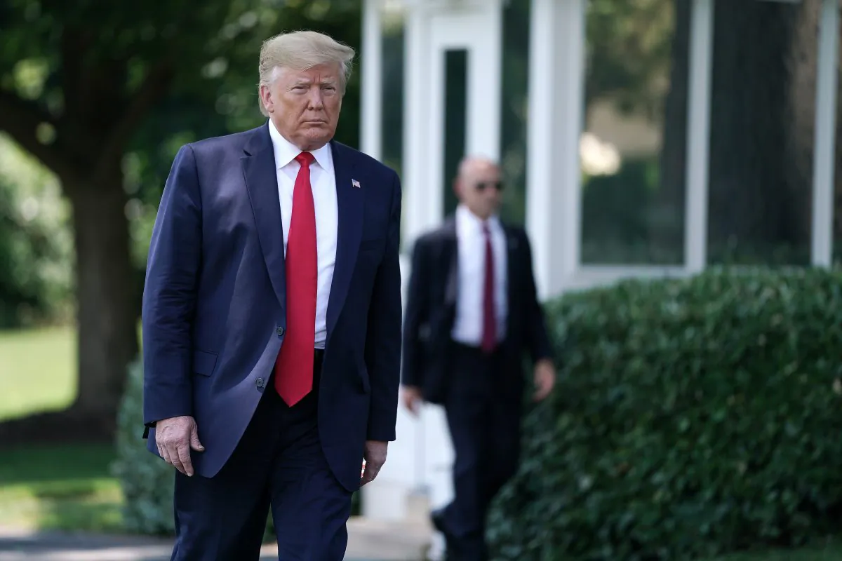 U.S. President Donald Trump walks to reporters before leaving the White House for the G20 summit in Washington, DC on June 26, 2019. (Chip Somodevilla/Getty Images)