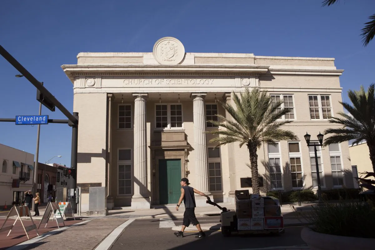 A man walks past the headquarters for the Church of Scientology in Clearwater, Fla., on Jan. 16, 2013. (Getty Images)