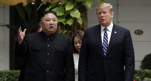 President Donald Trump and North Korean leader Kim Jong Un take a walk