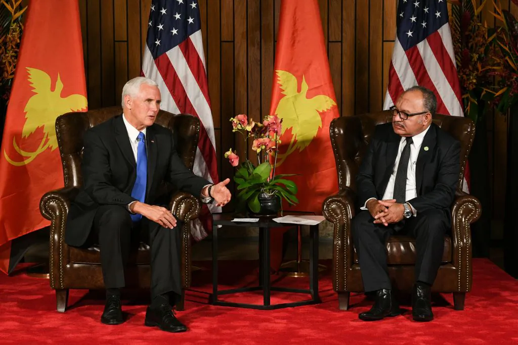 U.S. Vice President Mike Pence (L) speaks next to Papua New Guinea's Prime Minister Peter O'Neill during their bilateral meeting on the sidelines of the Asia-Pacific Economic Cooperation (APEC) Summit, in Port Moresby on Nov. 17, 2018.  (Saeed Khan/AFP/Getty Images)