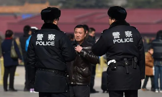 Chinese Police Step Up Phone Checks, Using Surveillance Apps