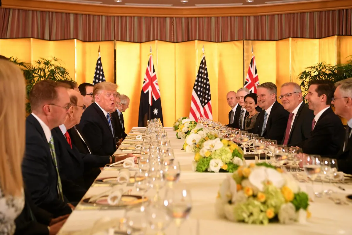 U.S. President Donald Trump and Australian Prime Minister Scott Morrison speak during a working dinner ahead of the official start of the G20 summit in Osaka, Japan, on June 27, 2019. (AAP Image/Lukas Coch)