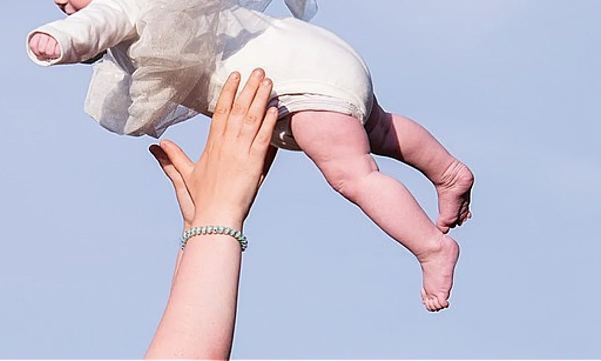 Stock image of a person catching a child. (Pixelwunder By Rebecca/Pixabay)