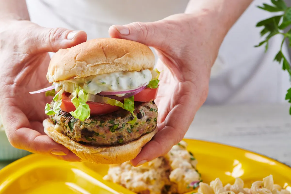 A juicy turkey burger makes a wonderful canvas for bright Mediterranean flavors. (Cheyenne Cohen/Courtesy of Katie Workman)