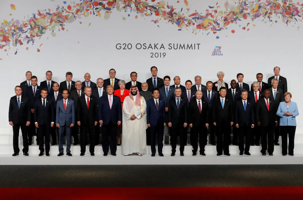 Japanese Prime Minister Shinzo Abe, other leaders and delegates attend a family photo session at G20 leaders summit in Osaka, Japan on June 28, 2019. (Kim Kyung-Hoon/Poo via Getty Images)