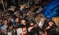 Overnight Scuffles as Hong Kong Protesters Continue “Fight” for Democracy