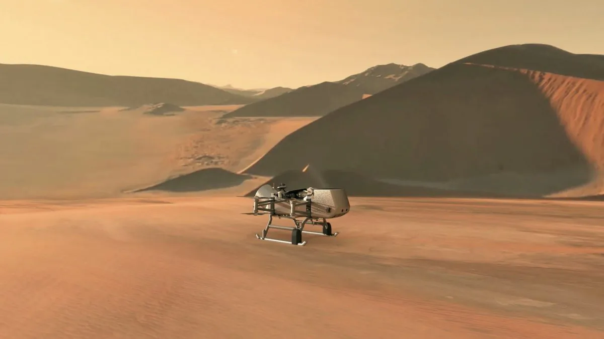 This illustration shows NASA's Dragonfly rotorcraft-lander approaching a site on Saturn's exotic moon, Titan. (JHU-APL/NASA)