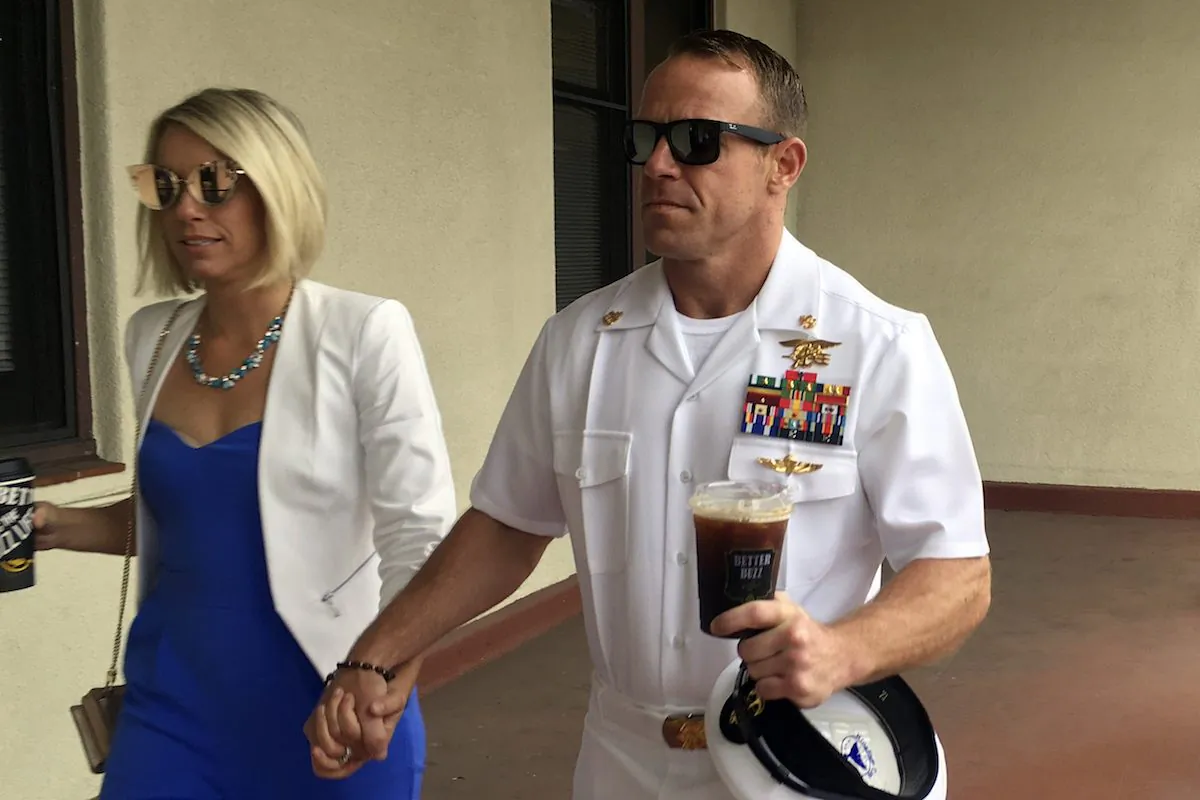 Navy Special Operations Chief Edward Gallagher (R) walks with his wife, Andrea Gallagher as they arrive to military court on Naval Base San Diego, in San Diego, Calif., on June 26, 2019.  (Julie Watson/AP Photo)