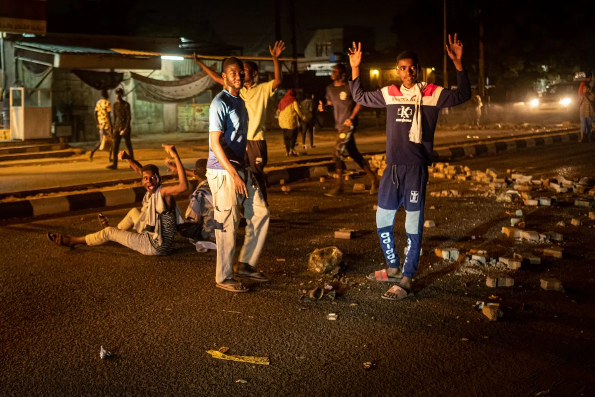 Sudanese protesters make a barricade on a road during their protest calling for the civilian goverment in Omdurman, the twin city of Khartoum, on June 22, 2019.(Yasuyoshi Chiba/AFP/Getty Images)
