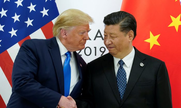 U.S. President Donald Trump meets with Chinese leader Xi Jinping at the start of their bilateral meeting at the G20 leaders summit in Osaka, Japan on June 29, 2019. (Kevin Lamarque/Reuters)