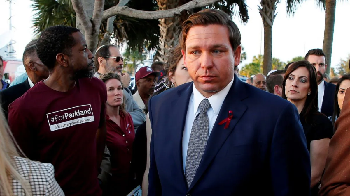 Florida Gov. Ron DeSantis arrives at a memorial service on the one-year anniversary of the shooting which claimed 17 lives at Marjory Stoneman Douglas High School in Parkland, Fla., on Feb. 14, 2019. (Joe Skipper/Reuters)