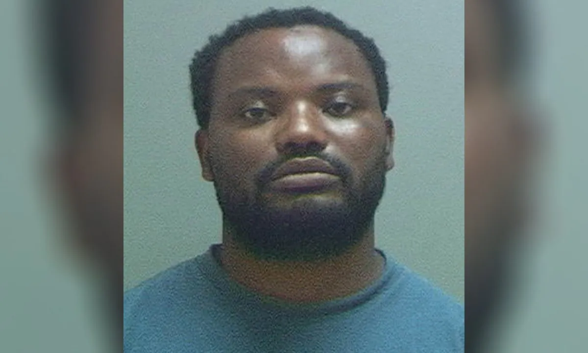 Ayoola Ajayi in a file booking photograph. (Salt Lake County Jail)
