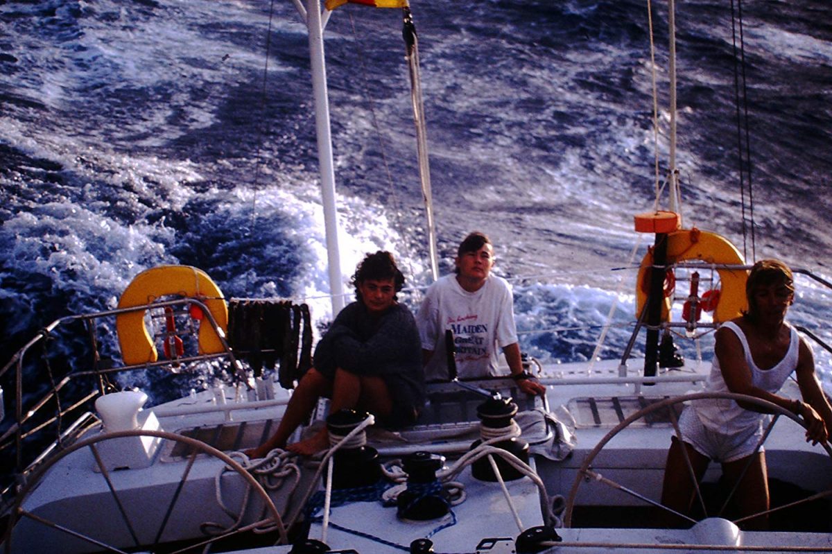 Three women on board a sailing boat
