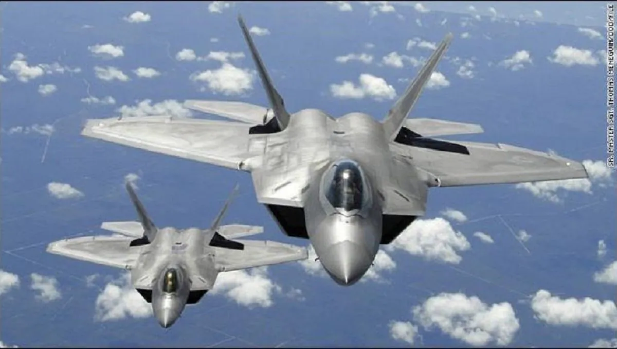 U.S. F-22 jets are seen in a file photo.  (Sr Master Sgt ThomasMenegiun/DOD)