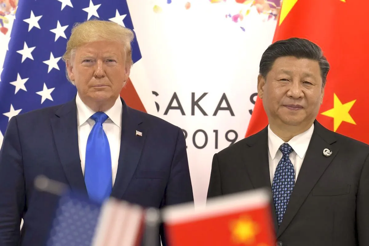 U.S. President Donald Trump (L) with Chinese leader Xi Jinping during a meeting on the sidelines of the G-20 summit in Osaka, Japan, on June 29, 2019. (AP Photo/Susan Walsh)