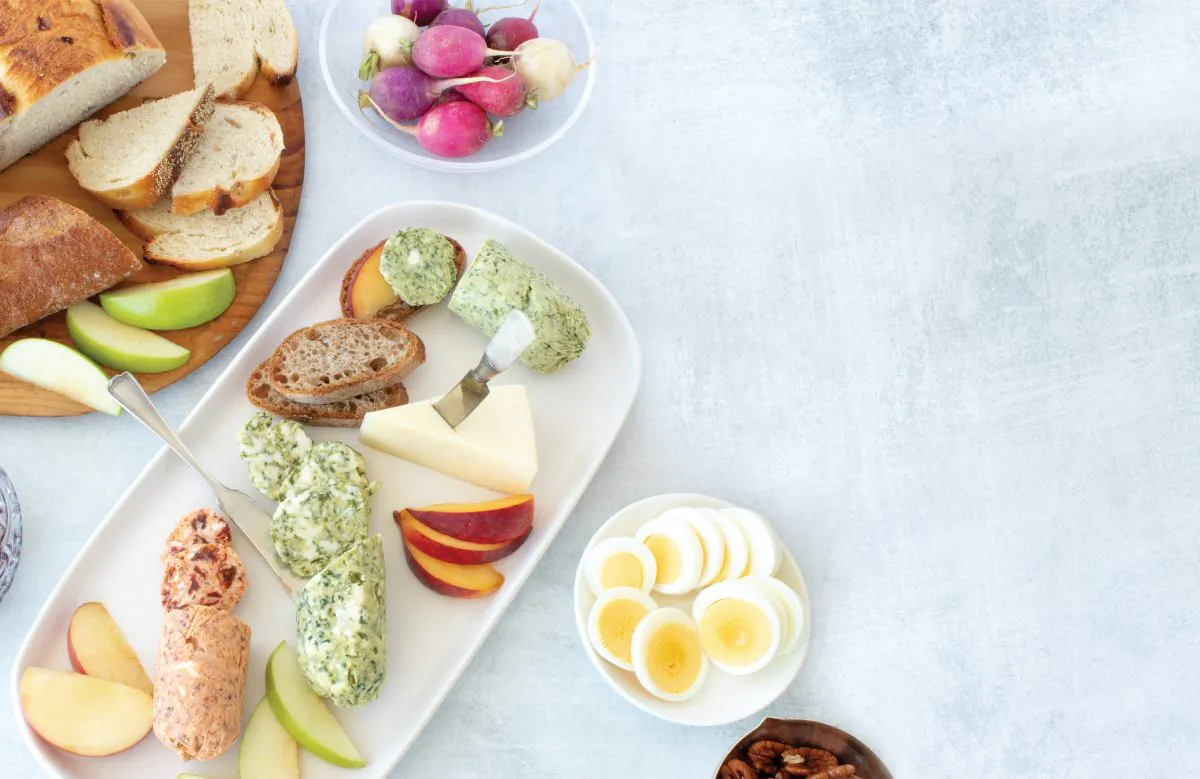 Add compound butters to a grazing board of bread, cheese, and fruits and veggies for easy entertaining. (Leslie Lennox)