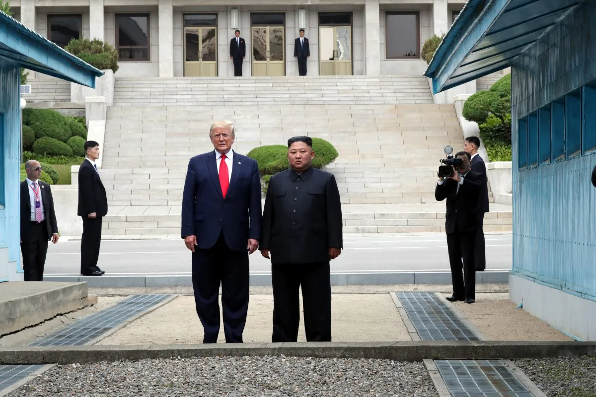 President Donald Trump and North Korean leader Kim Jong Un stand inside the demilitarized zone (DMZ) separating the South and North Korea in Panmunjom, North Korea, on June 30, 2019. (Handout photo by Dong-A Ilbo via Getty Images)