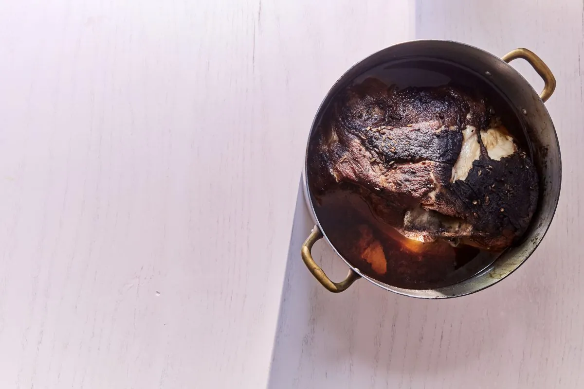 A slow-braised pork shoulder can easily feed a crowd—or your own family, for days. (Gentl + Hyers)