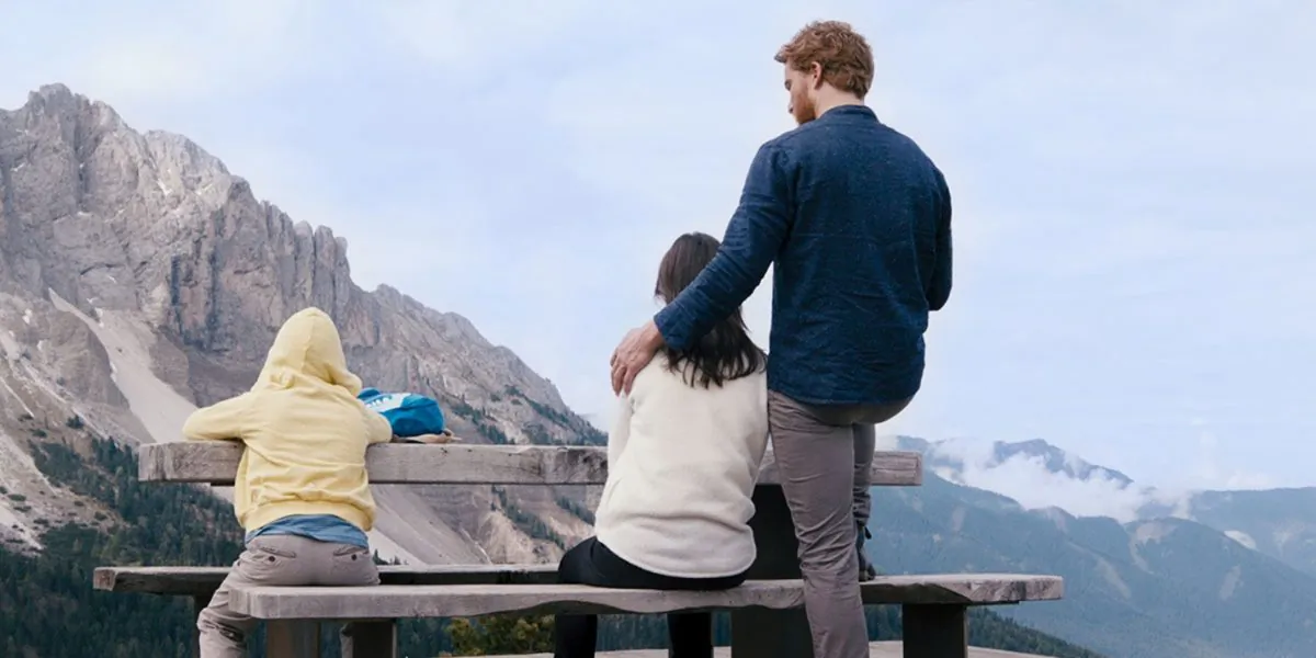 (L–R) Can these three form a family? Tristan (Arian Montgomery), his mother (Bérénice Bejo), and his mother’s boyfriend (Alexander Fehling), in “Three Peaks.” (Greenwich Entertainment)