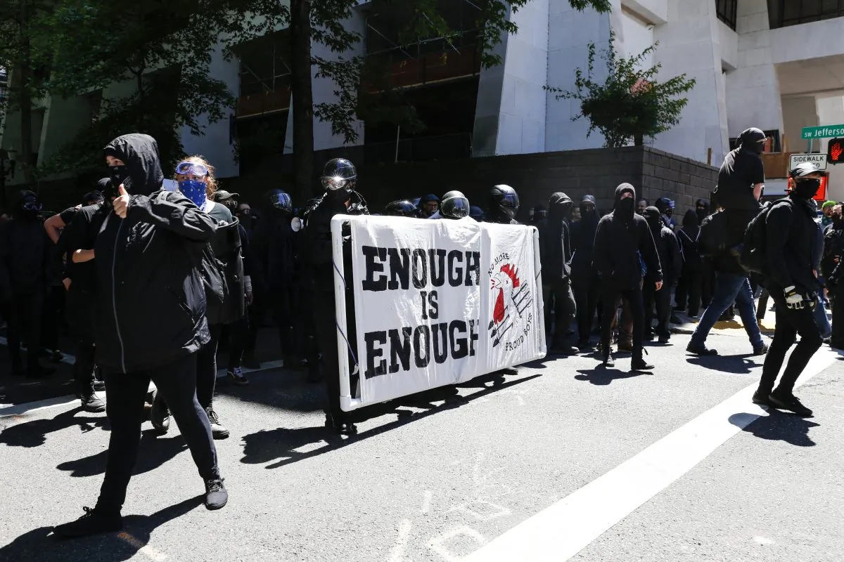 The Rose City Antifa prepare to march in opposition to members of HimToo and Proud Boys in Portland, Ore., on June 29, 2019. (Moriah Ratner/Getty Images)