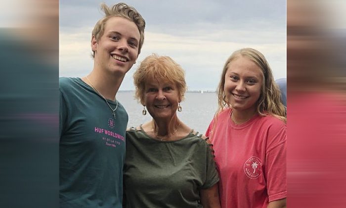 Lynn Fleming is seen with her grandchildren Jonathan and Jensen Fleming. Fleming stumbled and cut her leg while walking in Coquina Beach, near Bradenton, Fla., with her feet in the water during a family visiting from Pittsburgh. Fleming was later diagnosed with flesh-eating disease and died days later. (Wade Fleming via AP)