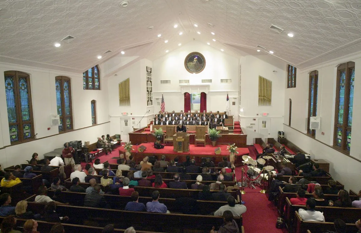 Parishioners sit inside the renovated Ebenezer Baptist Church in Atlanta, Ga., on Jan. 19, 2002. (Erik S. Lesser/Getty Images)