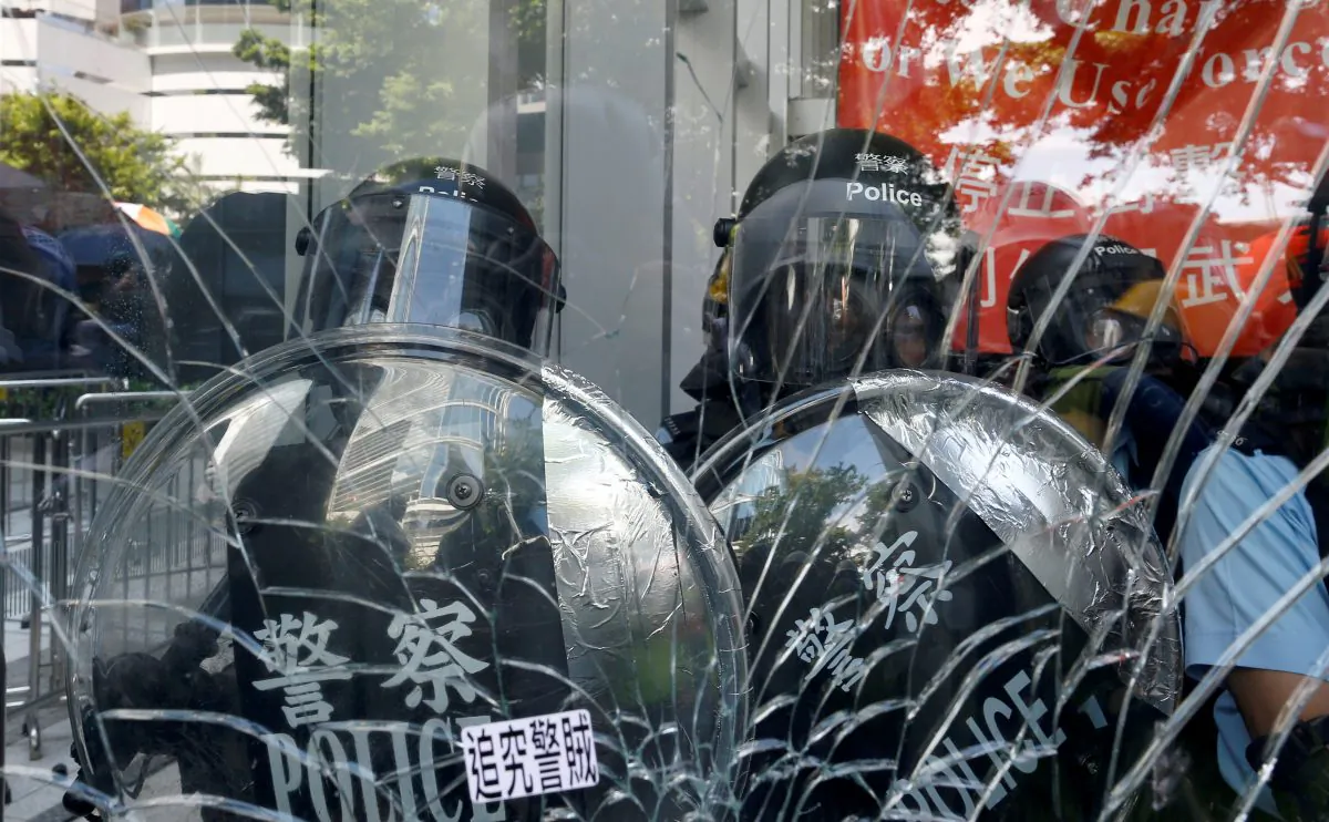Riot police inside the Legislative Council building where protesters try to break into, during the anniversary of Hong Kong's handover to China in Hong Kong, China July 1, 2019. (Thomas Peter/Reuters)