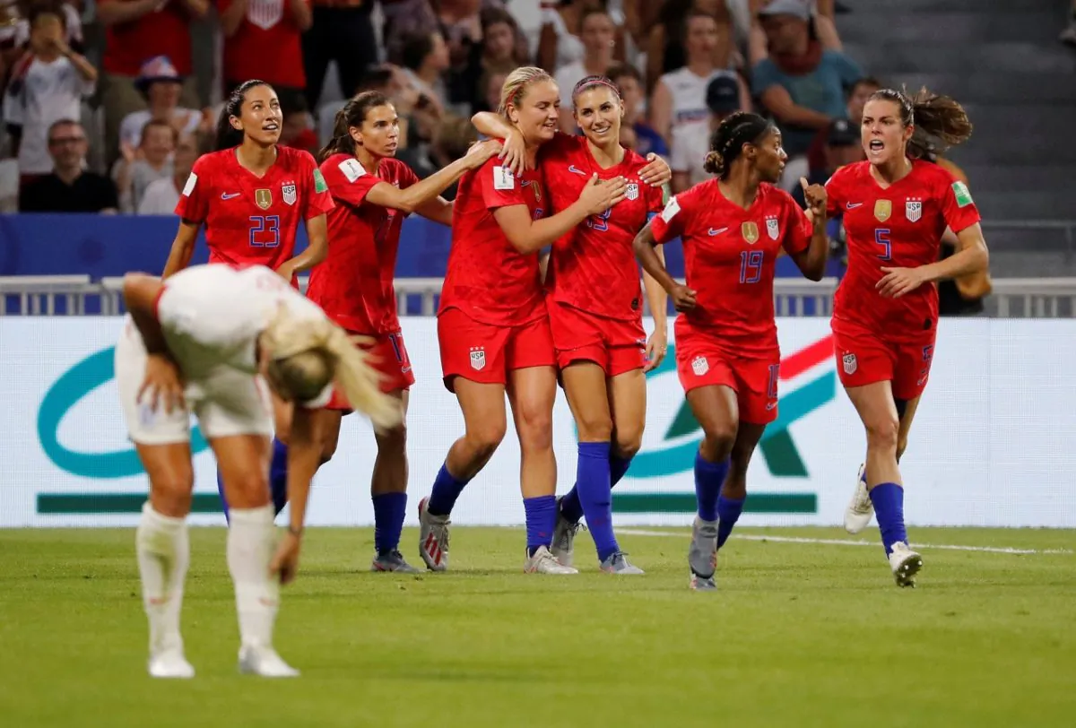 United Sates' Alex Morgan celebrates scoring their second goal with Lindsey Horan and team mates during the Women's World Cup semifinal soccer match between England and the United States, at the Stade de Lyon, outside Lyon, France, on July 2, 2019. (Bernadett Szabo/Reuters)
