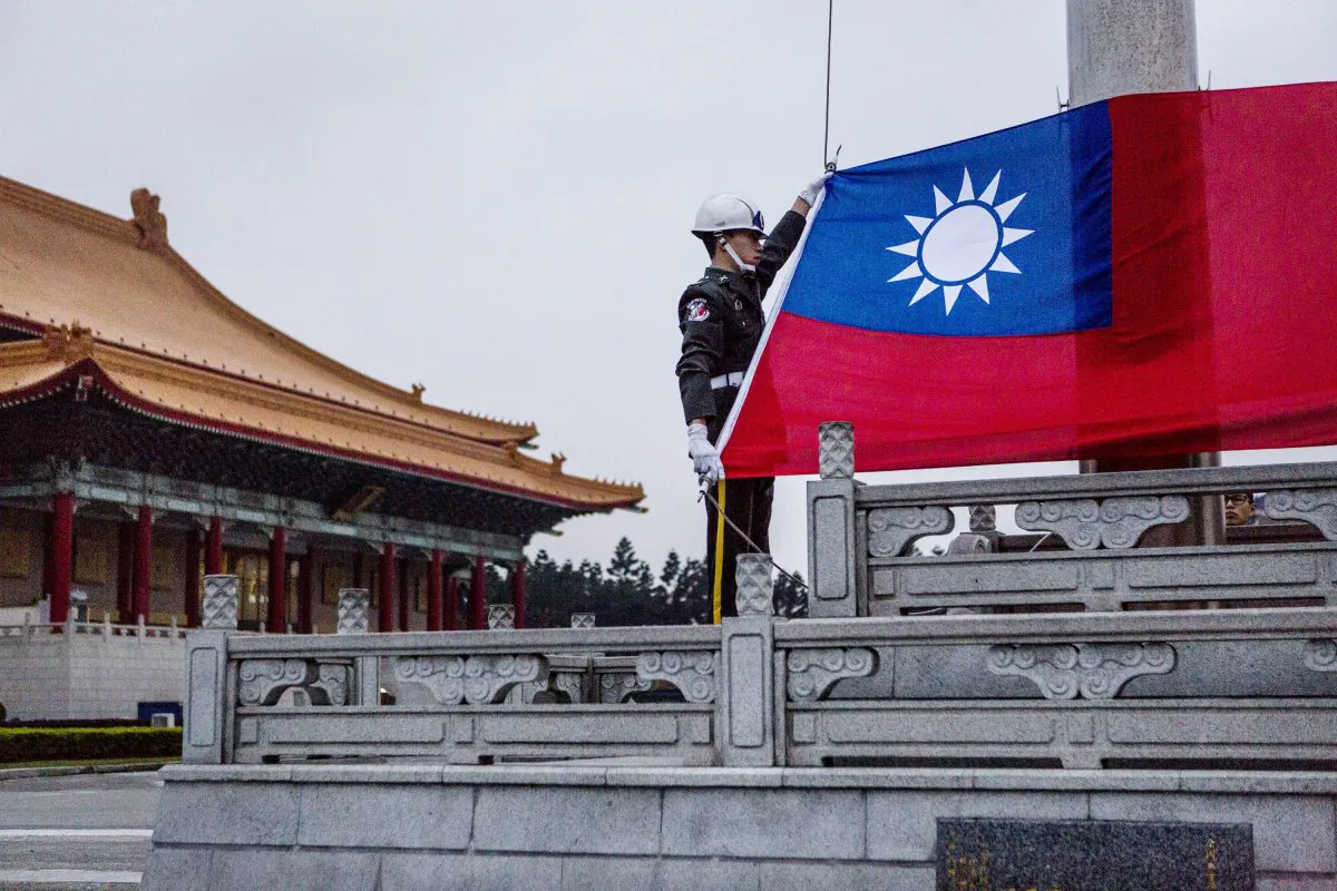 Honor guards prepare to raise the Taiwan flag in the Chiang Kai-shek Memorial Hall square ahead of the Taiwanese presidential election in Taipei, Taiwan on Jan. 14, 2016. (Ulet Ifansasti/Getty Images)