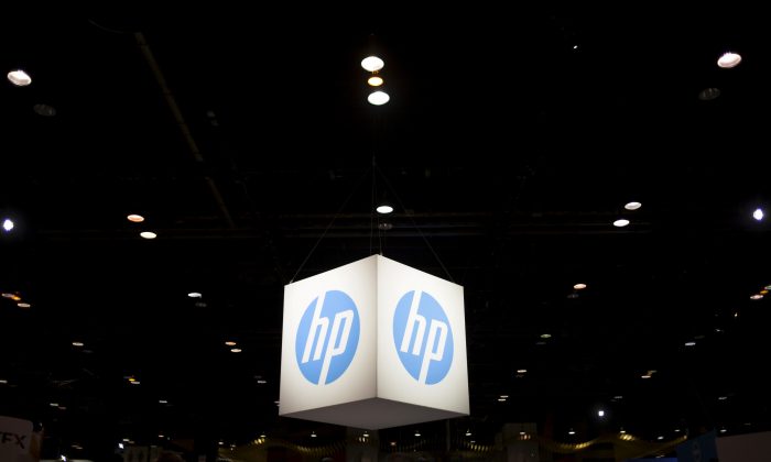 The Hewlett-Packard (HP) logo is seen as part of a display at the Microsoft Ignite technology conference in Chicago, Illinois, on May 4, 2015. (Jim Young/Reuters)
