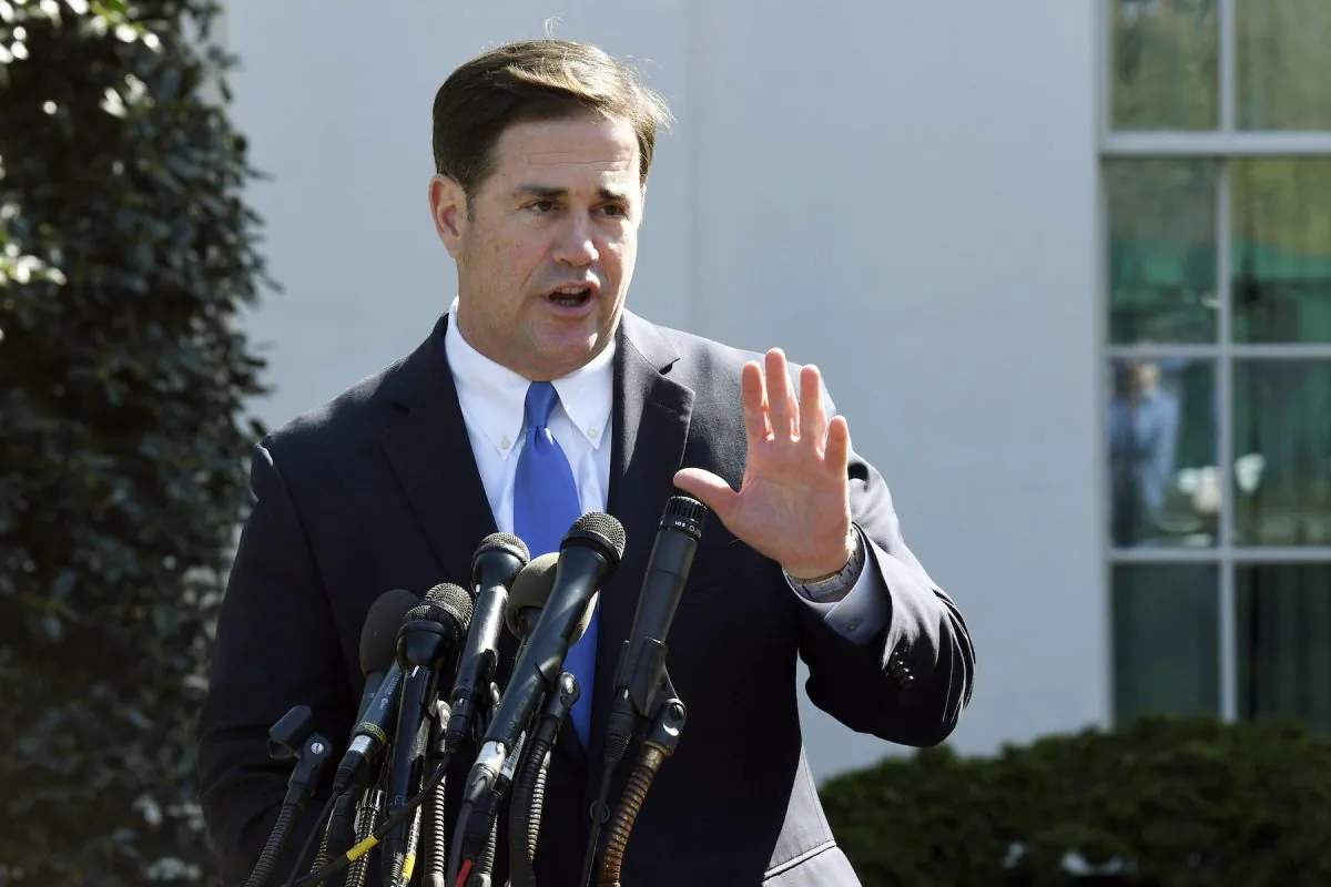 Arizona Gov. Doug Ducey talks to reporters outside the West Wing of the White House in Washington on April 3, 2019. (AP Photo/Susan Walsh, File)