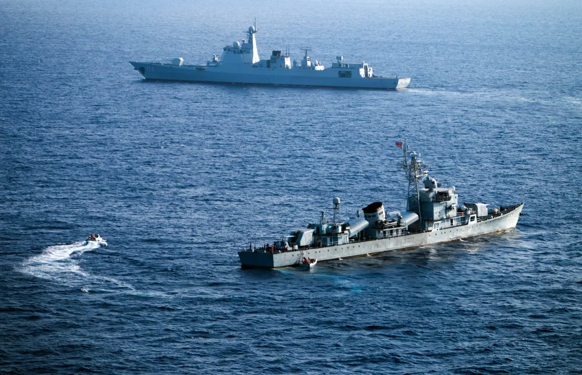 This photo taken on May 5, 2016 shows crew members of China's South Sea Fleet taking part in a drill in the Paracel Islands in the South China Sea. (STR/AFP/Getty Images)
